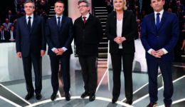 French presidential election candidates Francois Fillon, Emmanuel Macron, Jean-Luc Melenchon, Marine Le Pen and Benoit Hamon, pose before a debate organised by French private TV channel TF1 in Aubervilliers