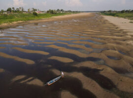 People affected by historic drought in the Amazon receive food and water
