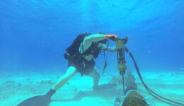 a-navy-construction-electrician-drills-to-install-cable-stabilizers-at-the-9b271d-1024