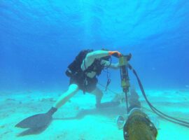 a-navy-construction-electrician-drills-to-install-cable-stabilizers-at-the-9b271d-1024